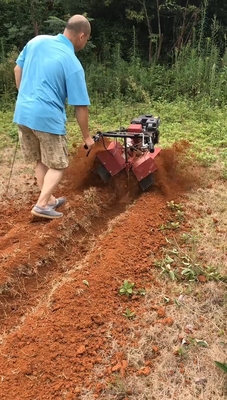 Largeur de travail de 70 cm Moteur à essence à quatre roues motrices